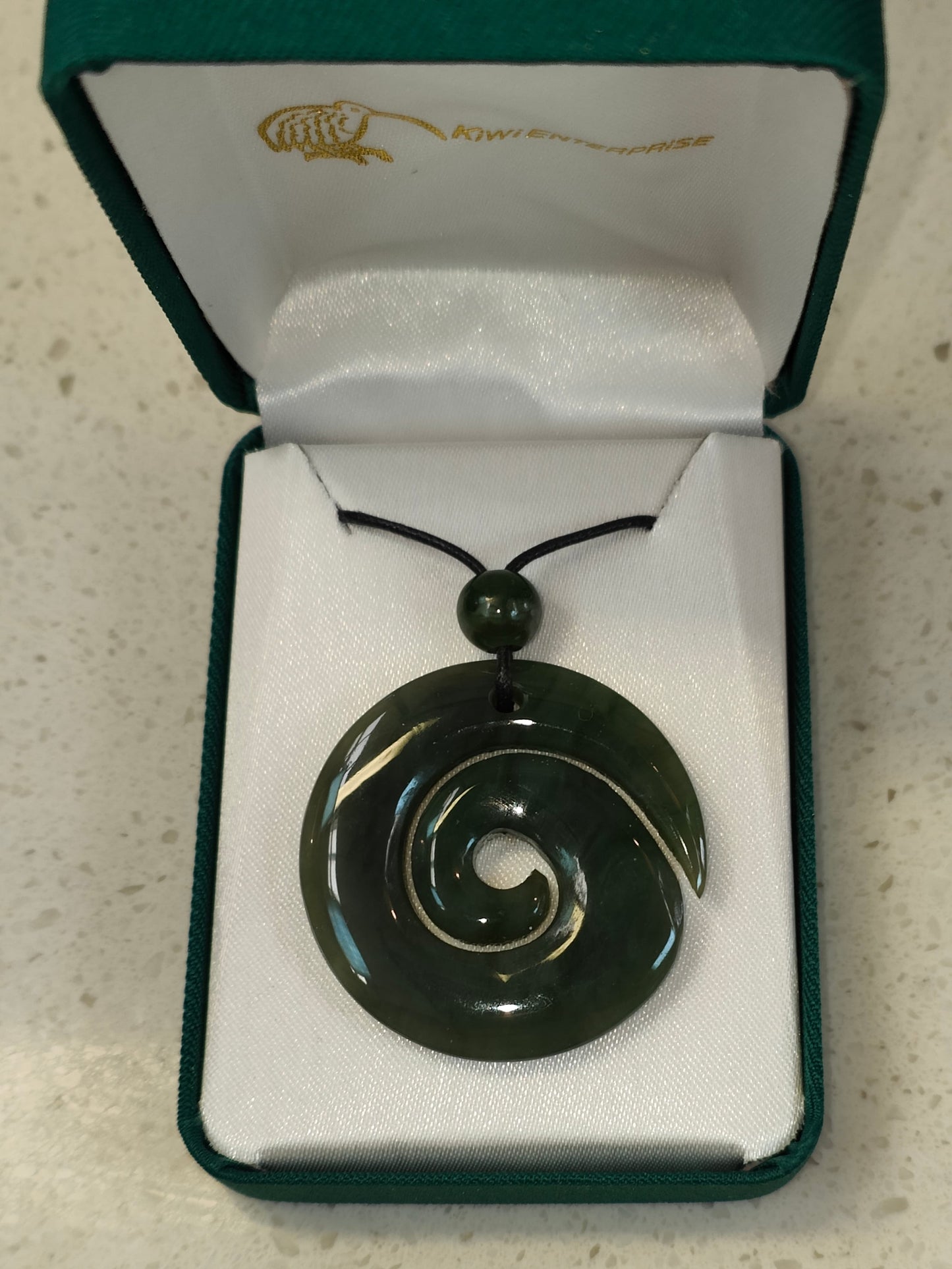 The koru (M?ori for 'loop or coil') is a spiral shape based on the appearance of a new unfurling silver fern frond. It is an integral symbol in M?ori art, carving and tattooing, where it symbolises new life, growth, strength and peace.