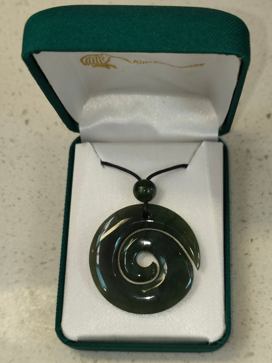 The koru (M?ori for 'loop or coil') is a spiral shape based on the appearance of a new unfurling silver fern frond. It is an integral symbol in M?ori art, carving and tattooing, where it symbolises new life, growth, strength and peace.