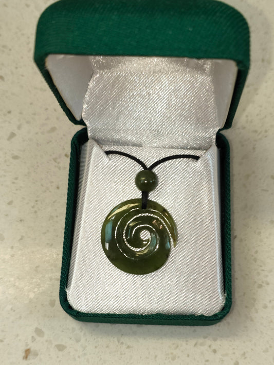 The koru (M?ori for 'loop or coil') is a spiral shape based on the appearance of a new unfurling silver fern frond. It is an integral symbol in M?ori art, carving and tattooing, where it symbolises new life, growth, strength and peace.