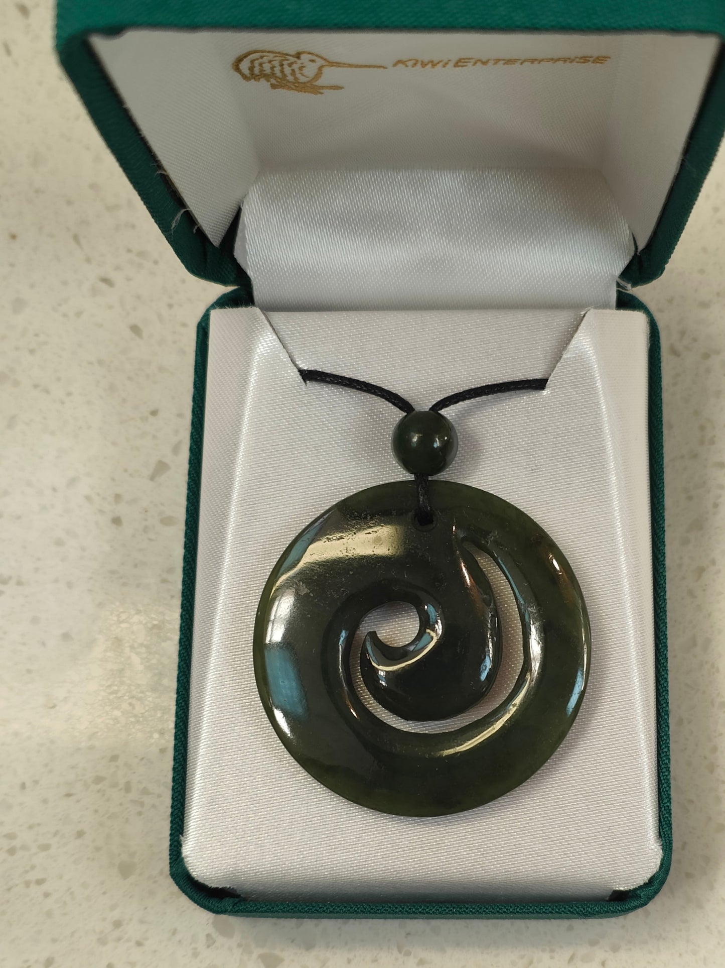 The koru (M?ori for 'loop or coil') is a spiral shape based on the appearance of a new unfurling silver fern frond. It is an integral symbol in M?ori art, carving and tattooing, where it symbolises new life, growth, strength and peace.